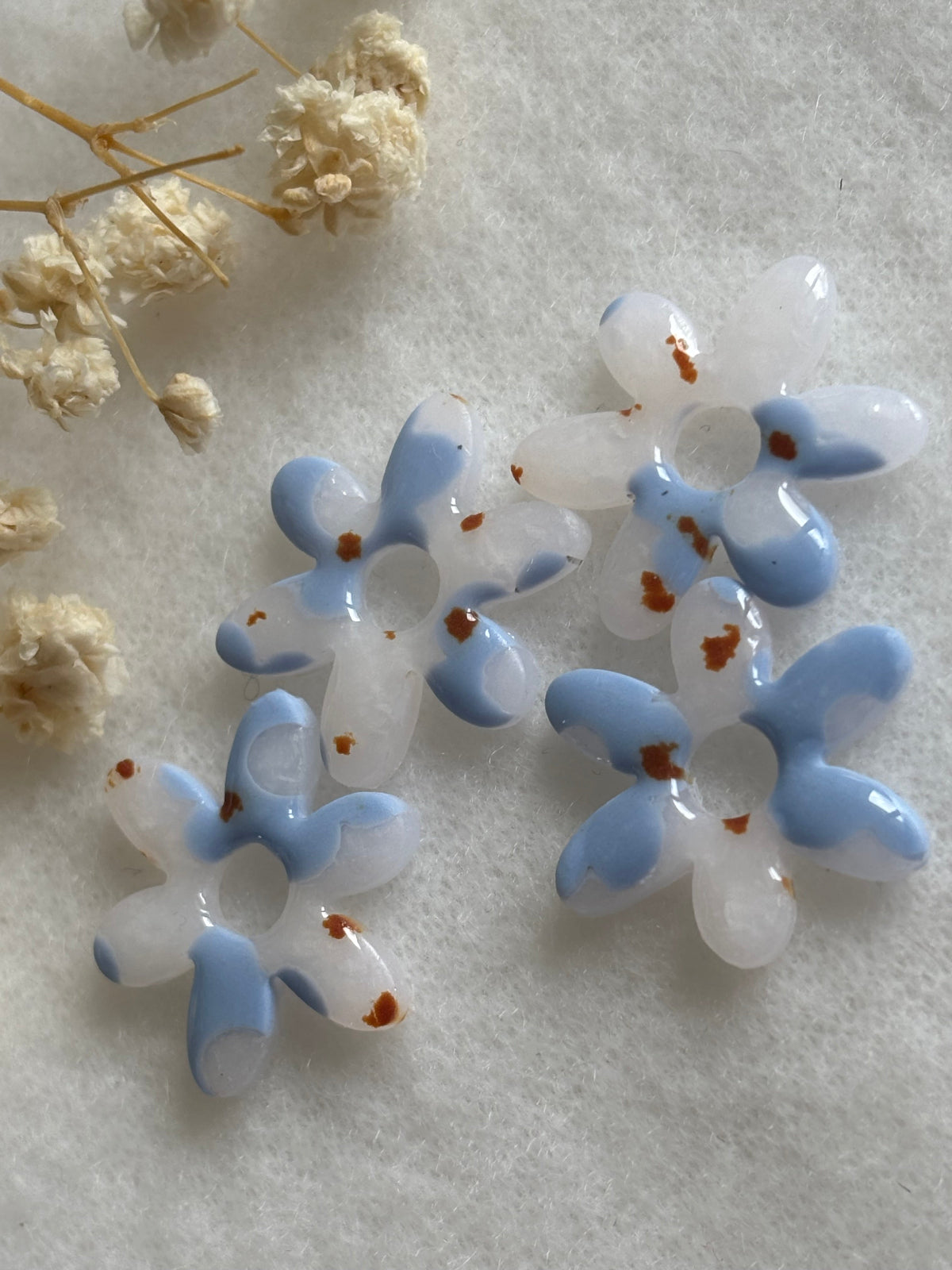 Pampilles interchangeables transparentes fleuris bleu et marron 